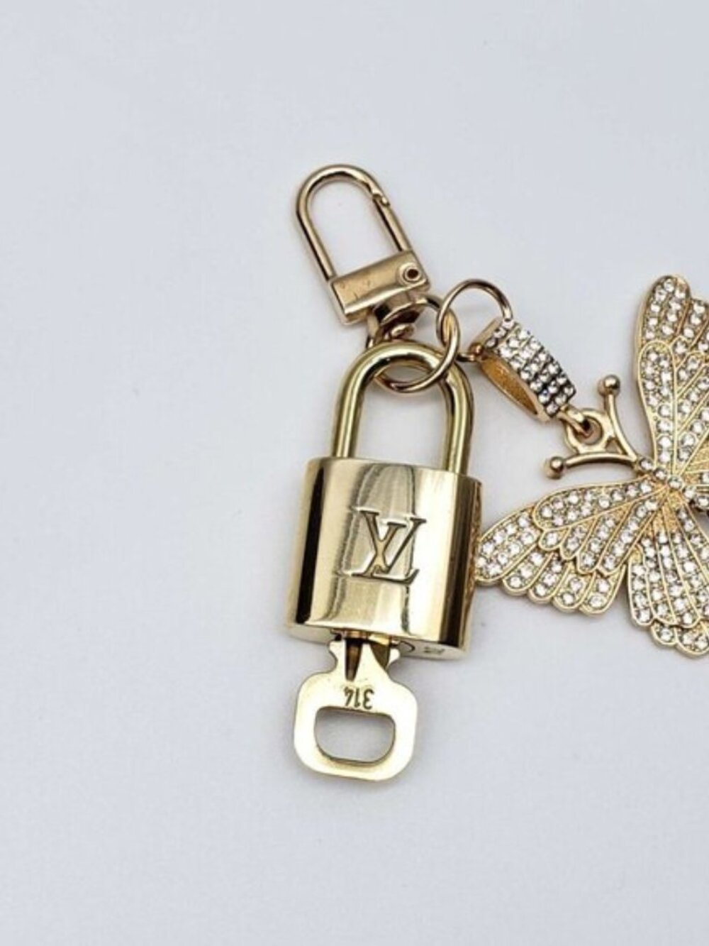 LV Authentic Gold Padlock 🔒 Key Set w/ Unbranded Butterfly Keychain Charm - Picture 4 of 5